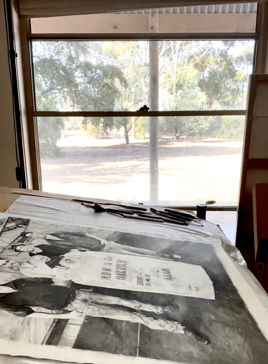  A drawing in progress on an artist’s studio table, sunlight filtering through a rural South Australian window — a glimpse into Jaime Prosser’s quiet creative process
